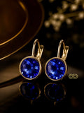 Pendientes de Lujo: Cristal Azul Profundo & Oro 18K